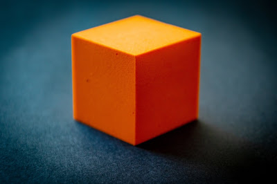 Orange Foam Block on Blue Table
