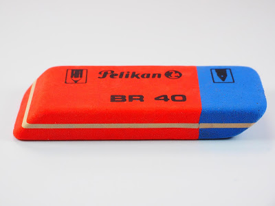A red and blue school eraser